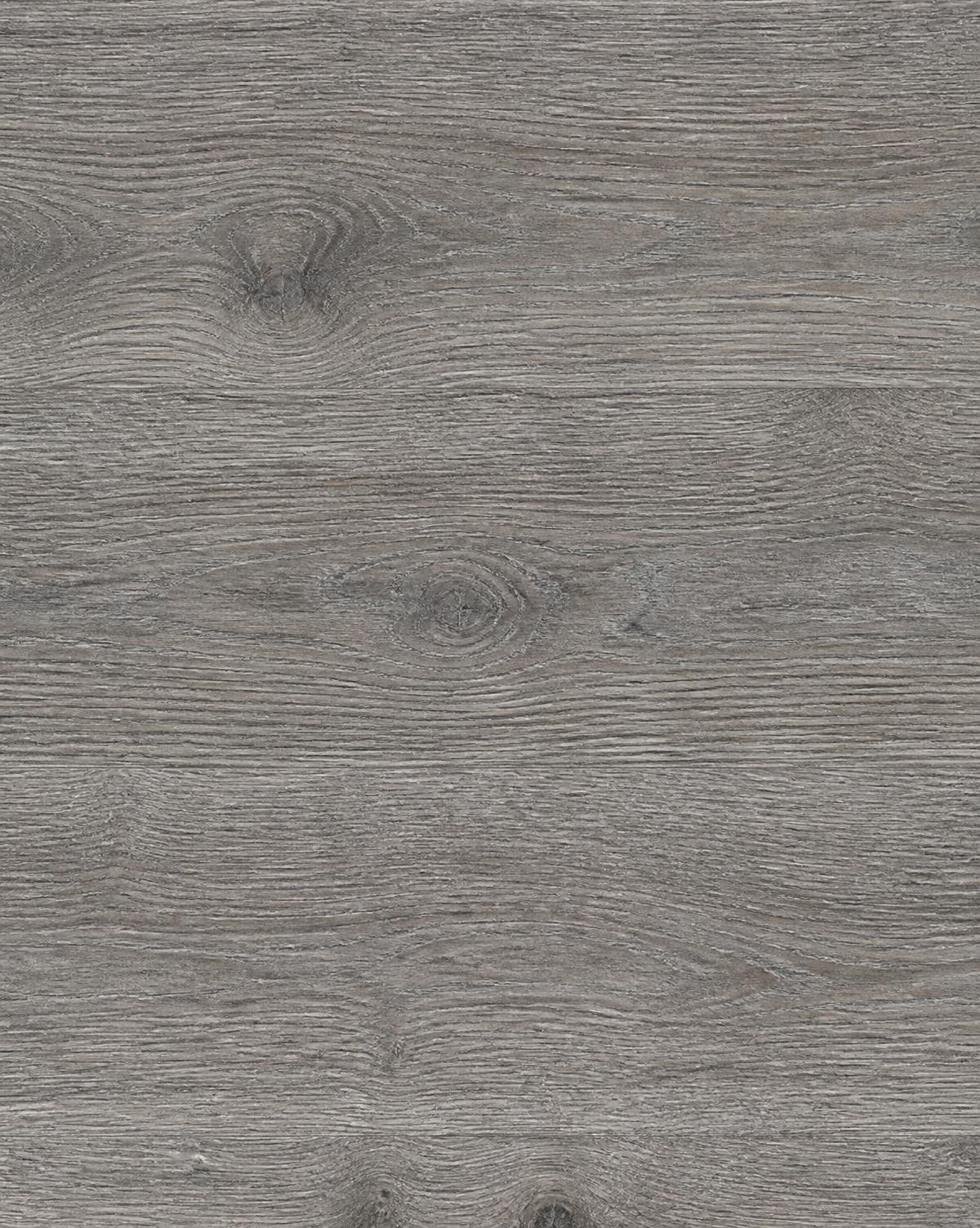 Plank crop of smoked umber oak with wire-brushed grain in neutral daylight