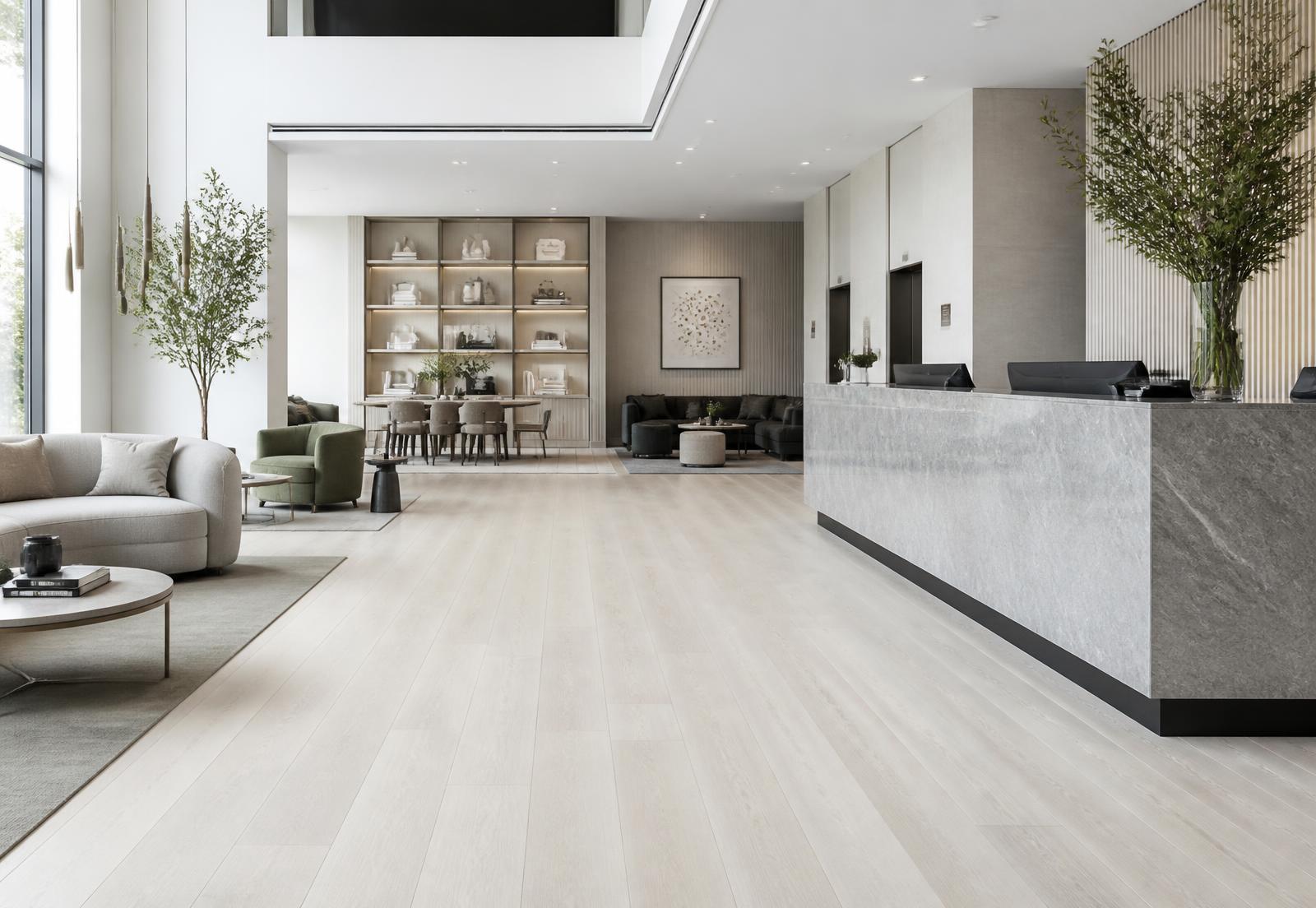 Hotel lounge with a wide-plank oak floor in the foreground under neutral daylight