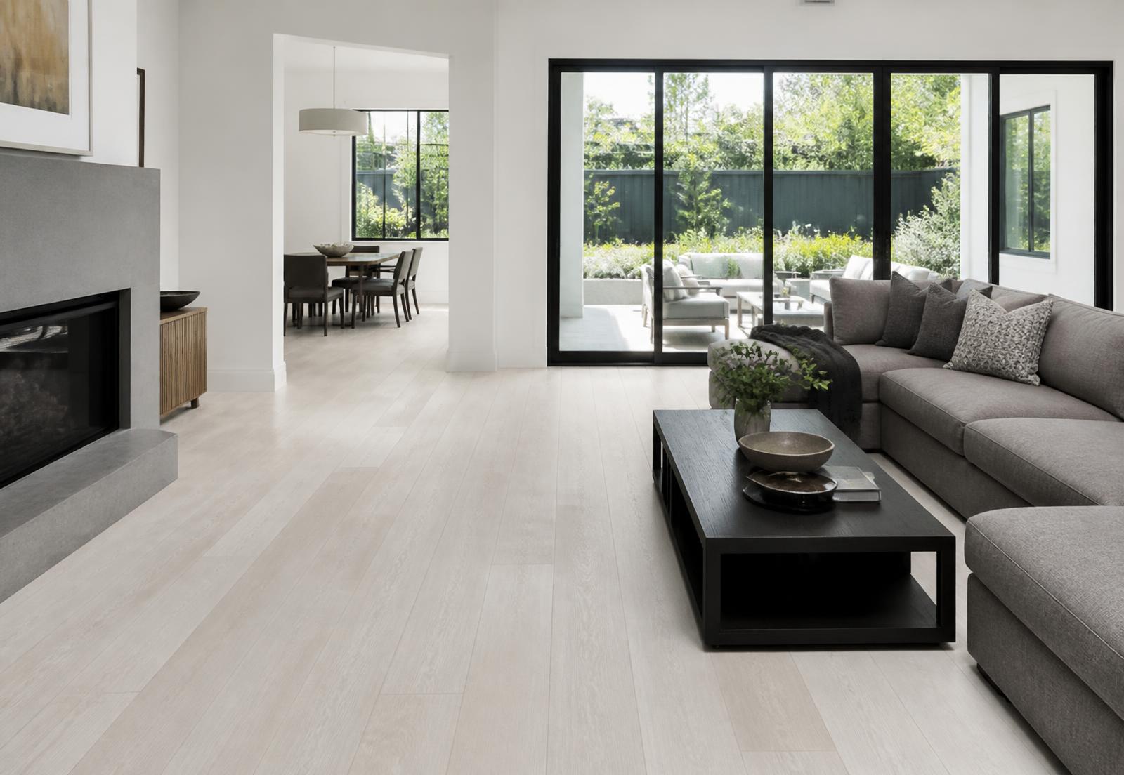 Residential living room with a pale oak floor filling the foreground